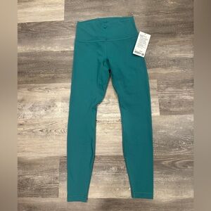 NEW with tags! Lululemon Wunder Train High-Rise Tight 28"
Teal Lagoon Sz 8